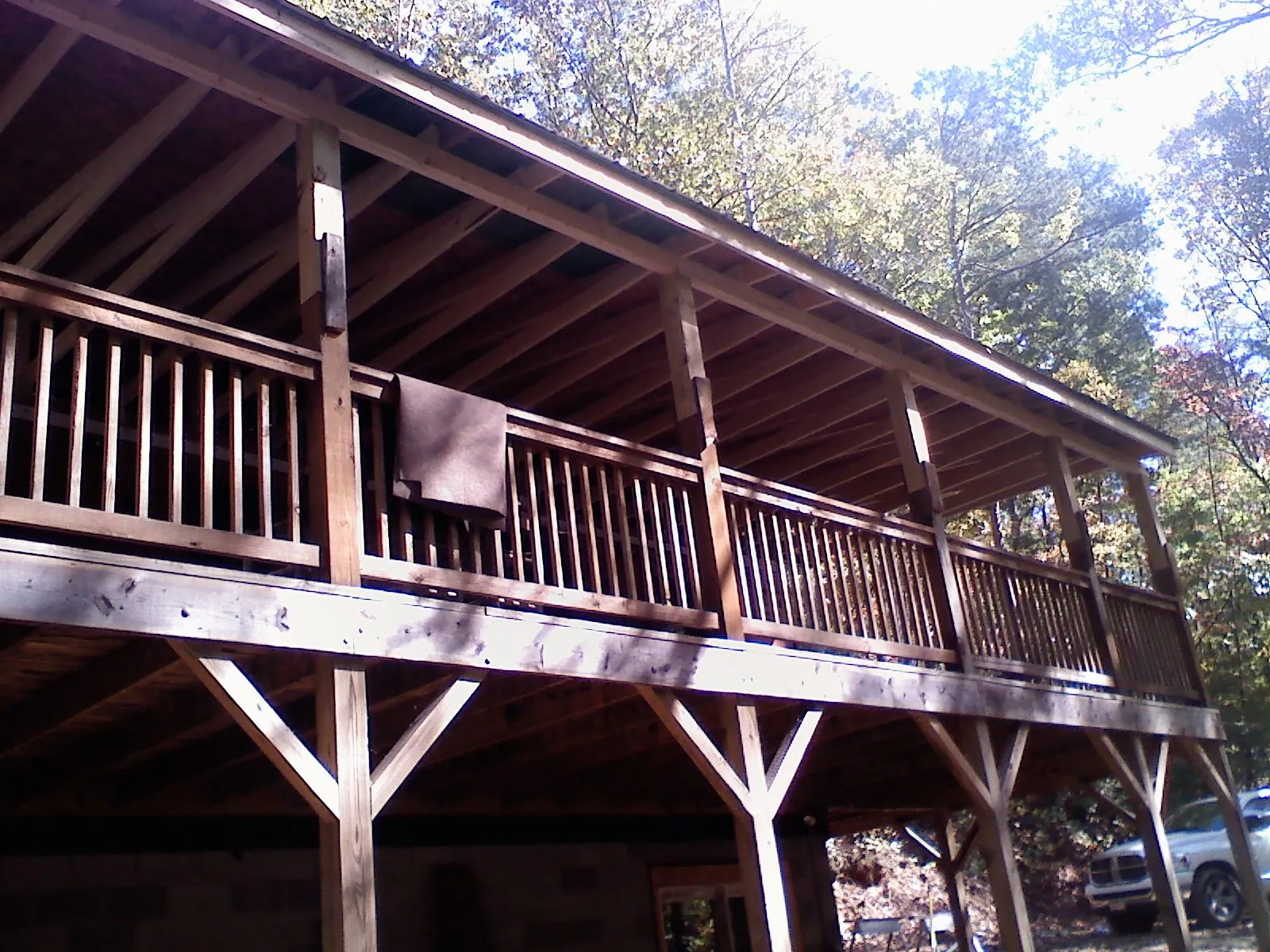 Timber framing under a new elevated porch and deck — Roof Leak Repair in Delphi Falls by Roofing Brothers